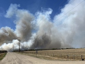 An out-of-control wildfire near Buck Creek has forced the evacuation of residents in Drayton Valley and Brazeau County late Thursday night on May 4, 2023.