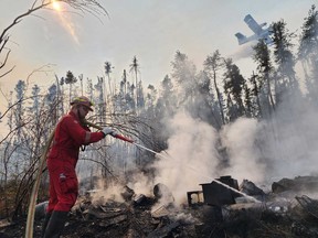 Firefighters from the La Longe Regional Fire Department fight a fire in northern Saskatchewan in May 2023 (Image credit: La Longe Regional Fire Department)