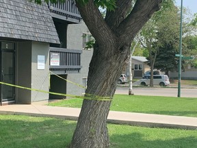 Police tape was still up around the entrance of an apartment building on Confederation Place on Monday, May, 29, 2023.