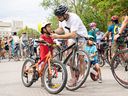Tod Fox and his sons Stacey and Nasa join hundreds of cyclists during the Natasha Fox Memorial Bike Ride. Natasha Fox, 33, was killed in a collision while cycling on May 24. Photo taken in Saskatoon, Sask. on Wednesday, May 31, 2023.
