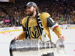 Chandler Stephenson #20 of the Vegas Golden Knights skates with the Stanley Cup following victory over the Florida Panthers in Game Five of the 2023 NHL Stanley Cup Final at T-Mobile Arena on June 13, 2023 in Las Vegas, Nevada.