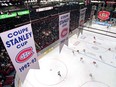 Banners hanging from the rafters of the former Montreal Forum marking the 24 Stanley Cup victories of the Canadiens, in Montreal Feb. 22, 1996. Friday marks three decades since the Montreal Canadiens last captured the Stanley Cup on a sweltering night at the Forum.