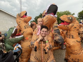 A crowd of inflatable dinosaurs