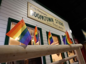 Boomtown at the Western Development Museum adorned with Pride flags.