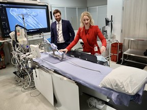 Cardiac surgeons Dr. Max Buchko and Dr. Janine Eckstein demonstrate the new transcatheter mitral valve repair device during a press conference at the Royal University Hospital Tuesday afternoon.