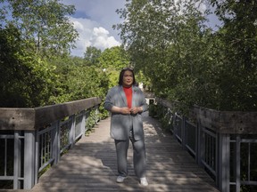 Tyler George, the youngest and first two-spirit councillor elected to Ochapowace First Nation leadership, and who also serves as Saskatchewan's two-spirit rep. to the AFN, stands for a portrait at Wascana Lake on Monday, June 5, 2023 in Regina.