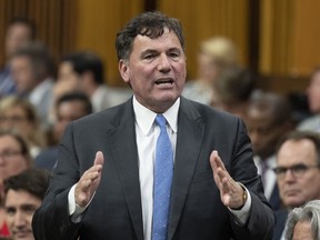 Infrastructure and Communities Minister Dominic LeBlanc rises during Question Period, in Ottawa, Tuesday, June 13, 2023. LeBlanc says details on the "next generations" of infrastructure funding programs are on track to be announced in the fall.