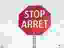 A bilingual stop sign is seen in Edmonton, Alberta in October of 2015.