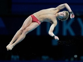 Diver Rylan Wiens competes at the Tokyo Olympics.