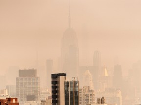 Smoke from Canadian wildfires shrouds the Empire State Building on June 30, 2023 in New York City.