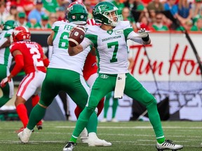 Saskatchewan Roughriders Trevor Harris throws a pass during CFL action against the Calgary Stampeders at McMahon Stadium on Saturday, June 24, 2023.