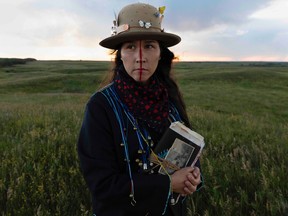 Meryl McMaster in her photograph The Grass Grows Deep, from 2022. Collection of Remai Modern.