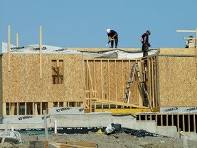 The construction industry is short tens of thousands of workers, and experts say a coming wave of retirements could make the problem worse even as Canada is millions of homes behind what it needs to build to reach housing affordability this decade. A new housing development is constructed just outside the edge of the Duffins Rouge Agricultural Preserve, Monday, May 15, 2023.THE CANADIAN PRESS/Chris Young