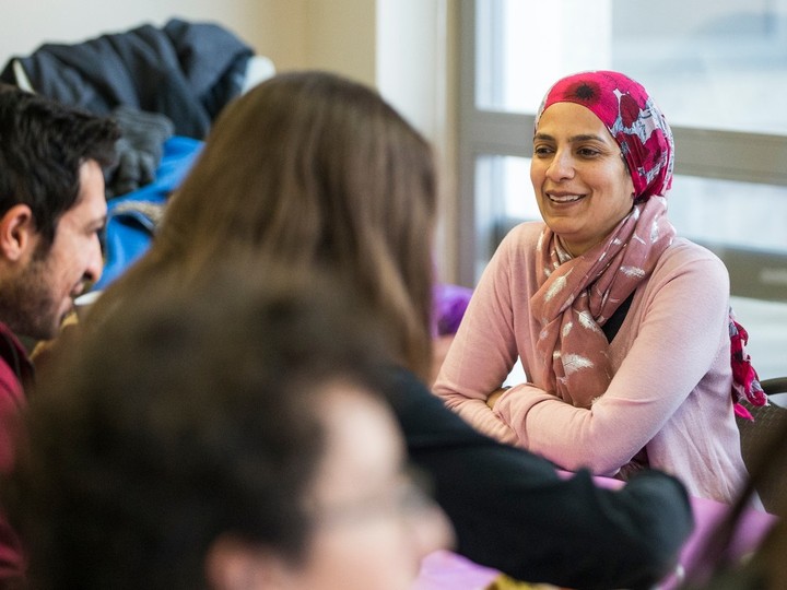  Sunni Muslim campus faith leader Fatima Coovadia, right, talks with students at the Good Breakfast program, a weekly breakfast hosted by faith leaders on the University of Saskatchewan campus in Saskatoon in 2020.