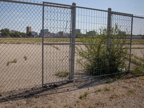 REGINA, SASK : August 3, 2023-- Temporary fences block entrance ways into the old Taylor Field Stadium lot to prevent houses people from setting up camp on Thursday, August 3, 2023 in Regina. KAYLE NEIS / Regina Leader-Post