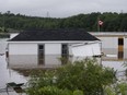 Buildings are seen in floodwater following a major rainfall in Halifax on Saturday, July 22, 2023.