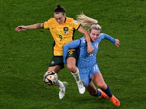 Australia's Caitlin Foord and England's Lauren Hemp compete for the ball during the Women's World Cup semifinal at Stadium Australia in Sydney on August 16, 2023.