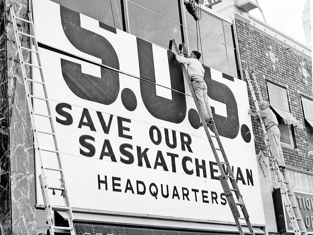 A collection of people from Regina, refusing to take sides in the medicare debate, formed a Save our Saskatchewan group to try to bring the government and doctors together. Offices of the group, where the sign was erected, pictured here on July 10, 1962, were was located on Scarth Street in Regina.