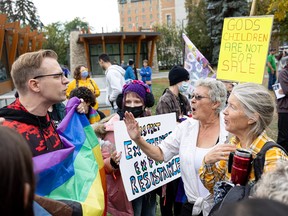 Heated exchanges between protesters and counter-protesters over school pronoun policy take place along Saskatoon's riverbank Wednesday. Photo taken in Saskatoon, Sask. on Wednesday, September 20, 2023.