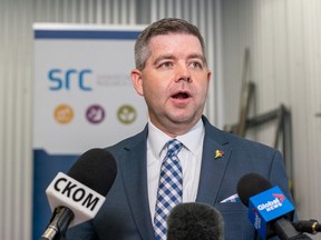 Jeremy Harrison, current Minister of Trade and Development and former Minister Responsible for the Saskatchewan Research Council (SRC), speaks during a media scrum after the grand opening of a new SRC Mining & Minerals Facility in Saskatoon in June.