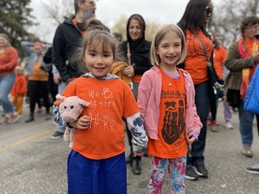 Children wearing orange shirts