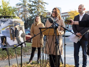 Opposition NDP Leader Carla Beck, Education Critic Matt Love and Cathlia Ward, who is a parent with children attending Monique Rousseau elementary school, hold a press conference in front of the school which has had a gaping hole in the roof since last school year. Photo taken in Saskatoon, Sask. on Tuesday, October 10, 2023.