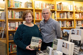 Bill Waiser and Jennie Hansen, authors of the new book ‘Cheated: The Laurier Liberals and the theft of First Nations reserve land’ stand for a photo in the history section at McNally Robinson.