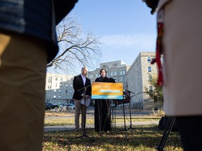 Rural and Remote Health Critic Matt Love and Official Opposition Health Critic Vicki Mowat respond to critical capacity issues in front of Royal University Hospital. Photo taken in Saskatoon, Sask. on Monday, October 16, 2023.