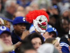 A fan wears a clown mask during a game between the Indianapolis Colts and the New Orleans Saints at Lucas Oil Stadium on October 29, 2023 in Indianapolis, Indiana.