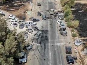A grab taken from a UGC video posted on the Telegram channel "South First Responders" on October 9, 2023, shows the aftermath of an attack on the Supernova music Festival by Palestinian militants, near Kibbutz Reim in the Negev desert in southern Israel on October 8.
