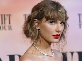 Taylor Swift arrives at the world premiere of the concert film "Taylor Swift: The Eras Tour" on Wednesday, Oct. 11, 2023, at AMC The Grove 14 in Los Angeles.