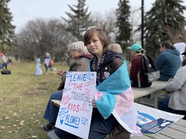 15-year-old Elliott CJ attends a rally for trans rights in Saskatoon, Saskatchewan on October 21, 2023.