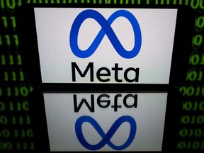 FILE: This picture taken on January 12, 2023 in Toulouse, southwestern France shows a tablet displaying the logo of the company Meta.