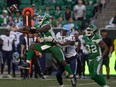 Saskatchewan Roughriders linebacker Larry Dean (11) goes to cacth the ball during the second half of CFL action at Mosaic Stadium on Saturday, October 21, 2023 in Regina.