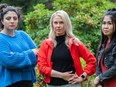 Sasha Reid (in red), Florence Tang (in black) and Ayah Ellithy (in blue) in North Vancouver Saturday, June 10, 2023. The three are pat of a project to compile data on murdered and people in Canada.