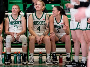 (From left) University of Saskatchewan Huskies guard Gage Grassick, guard Tea DeMong and forward Carly Ahlstrom were each named Canada West all-stars for the 2023-24 women's basketball season