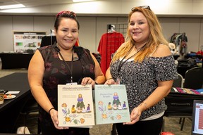 SASKATOON, SASK. - November 15, 2023 - 1116 news cree language - Mary Jane Felix and Elizabeth Felix run the Four Spirits Plains Cree Language Training booth during the Braiding Knowledge for a Clean Future conference at Prairieland Park. Photo taken in Saskatoon, Sask. on Wednesday, November 15 2023. (Michelle Berg / Saskatoon StarPhoenix)