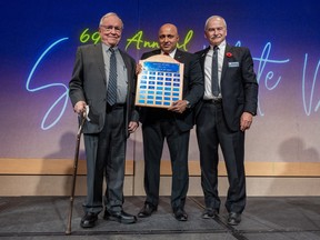 2023 We Are Proud Of You Award Winner Bob Jeanneau, left, is presented his award by Faisal Khorshid, Khorshid and Associates, centre, and David Katzman, President of B'nai Brith Lodge #739, right, during the 69th annual B'nai Brith Dinner at TCU Place in Saskatoon, SK, November 7, 2023.