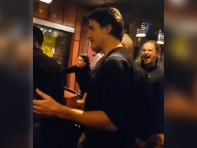 Videos posted earlier in the evening show Trudeau being heckled by protesters inside a Vancouver restaurant.