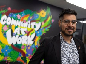 Victor Roman Morrow, Manager of Community Impact & Communication at SSCF stands for a portrait at Path Cowork on Friday, Nov. 3, 2023 in Regina.