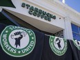 Starbucks Workers United t-shirts outside a Starbucks location in Boston, Massachusetts.