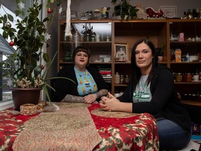 Artists Geanna Dunbar and Brandy Jones who have their Path to Reconciliation Project featured by National Museum of Women in the Arts magazine in Washington D.C, sit for a portrait in Jones's home on Tuesday, December 12, 2023 in Regina.