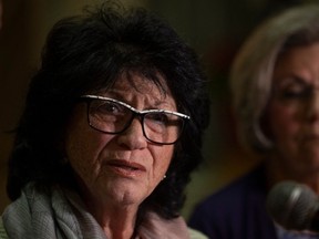 Gwen Gilbert, mother of Andrea Parmar who continues to question whether mistreatment of their daughter at Yorkton Hospital contributed to her death in 2022, speaks to the press after question period in the Saskatchewan Legislative Building on Wednesday, December 6, 2023 in Regina.