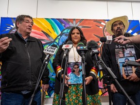 Darryl Burns, left to right, whose sister Gloria was one of the people killed on James Smith Cree Nation, Chelsey Stonestand, a representative of Burns' family, and Brian (Buggy) Burns, who's wife, Bonnie, and son, Gregory, were both killed, speaks to media following the final day of the public coroner's inquest into the mass stabbings that happened on James Smith Cree Nation in 2022 in Melfort, Sask. on Wednesday, January 31, 2024.