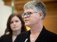 Nadine Baker who has been waitlisted for diagnostic care for nearly a year despite experiencing breast cancer symptoms, speaks about their experiences to the press inside the Saskatchewan Legislative Building on Monday, January 22, 2024 in Regina.