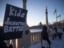 Saskatchewan Teachers' Federation members and supporters march across the Albert Memorial Bridge during a provincial teachers strike on Tuesday, January 16, 2024 in Regina. KAYLE NEIS / Regina Leader-Post