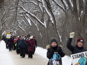 Teachers and supporters walk the picket line for the second one-day province wide strike action over stalled collective bargaining with the province on Monday, January 22, 2024 in Regina.