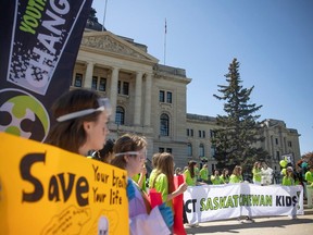 Youth4Change members hold a rally to encourage the Saskatchewan government to develop regulatory measures to protect Saskatchewan youth from vaping and tobacco products outside of the Saskatchewan Legislature on Tuesday, May 16, 2023 in Regina.