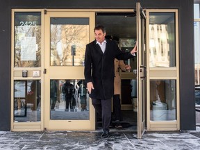 Deron Kuski, private counsel for Government of Saskatchewan, walks out of the Court of King's Bench during lunchbreak of a hearing regarding legal action against the Saskatchewan government's pronoun consent policy in Regina on Wednesday, January 10, 2024.