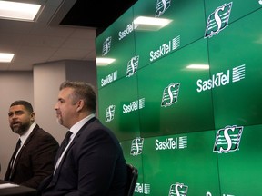 Saskatchewan Roughriders head coach Corey Mace sits beside general manager Jeremy O'Day during a press conference welcoming Mace to his new position on Friday, December 1, 2023 in Regina.